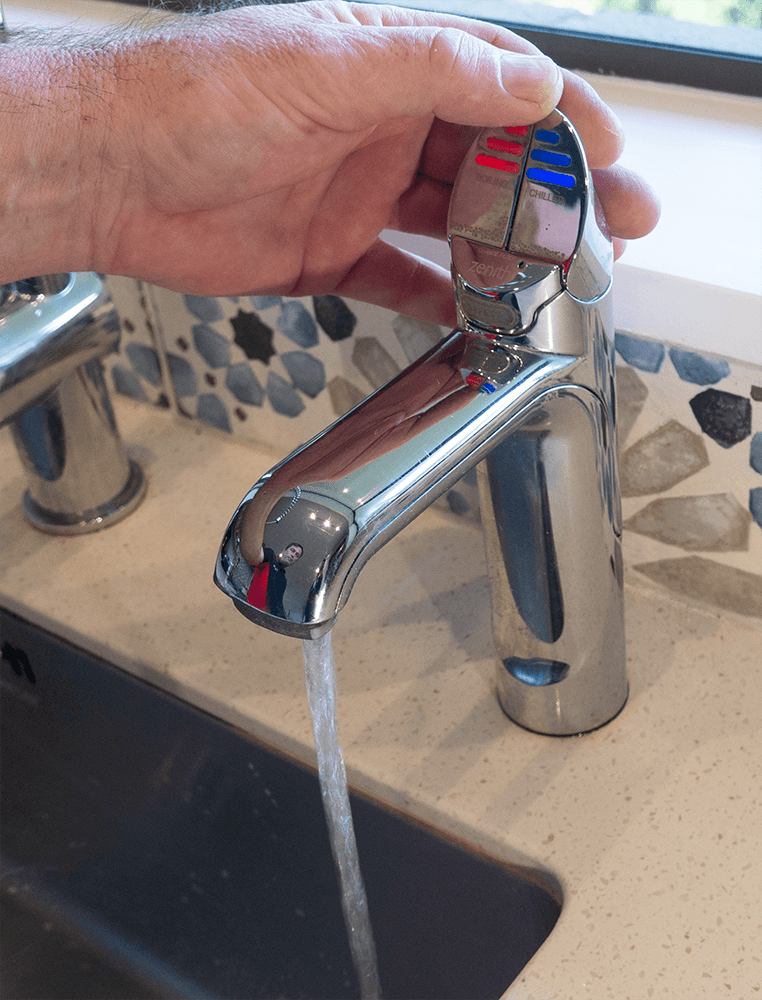 Chrome HydroTap with water flowing